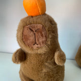 Pelúcia Capivara com Laranja 🍊🦦