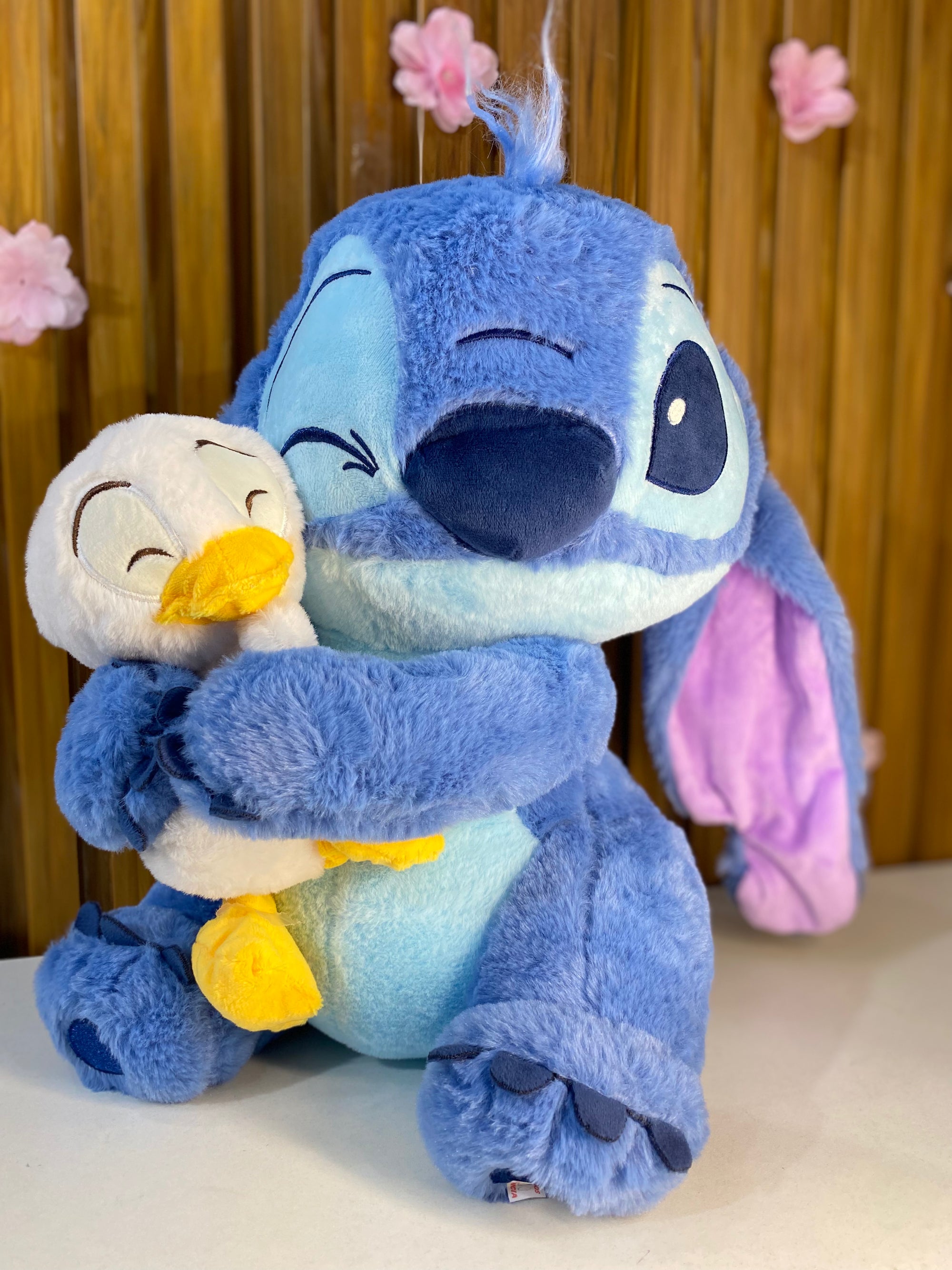Pelúcia do Stitch Piscando com Pato 40cm