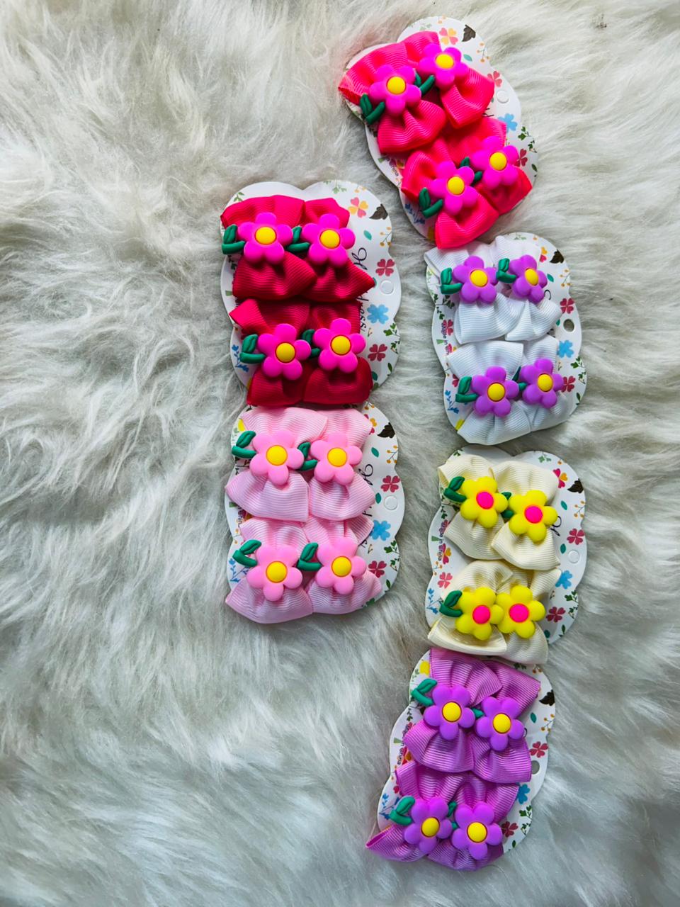 🎀 Kit Laços Infantis com Flores
