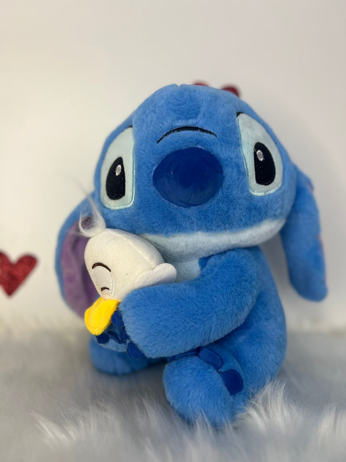 Pelúcia Stitch 25cm com Patinho